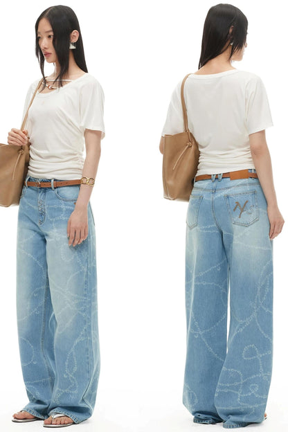 Washed Laser Print Denim Pants