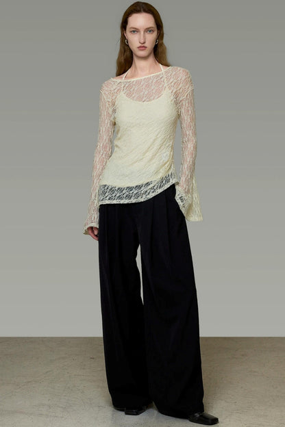 Blusa elegante in pizzo con spalline