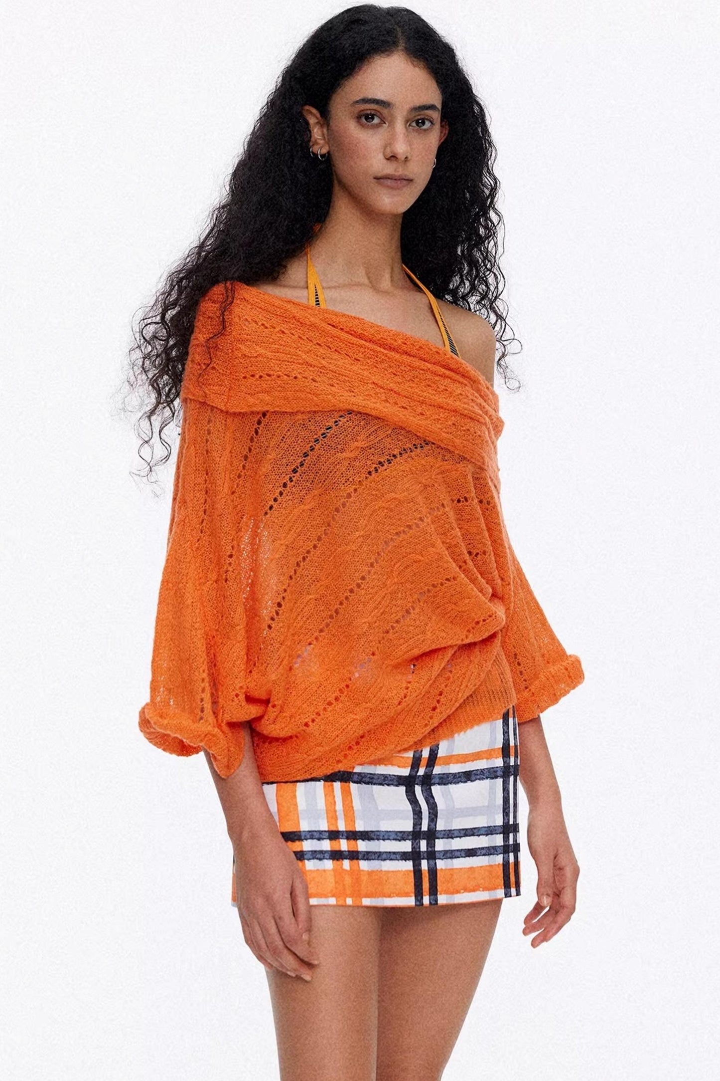 Vibrant orange one-shoulder oversized knit blouse for a bold summer look