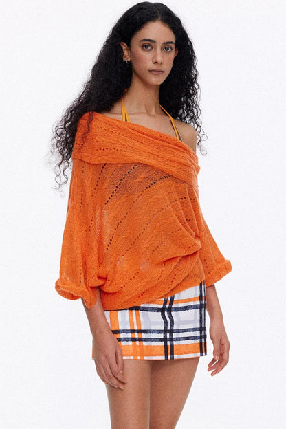 Vibrant orange one-shoulder oversized knit blouse for a bold summer look