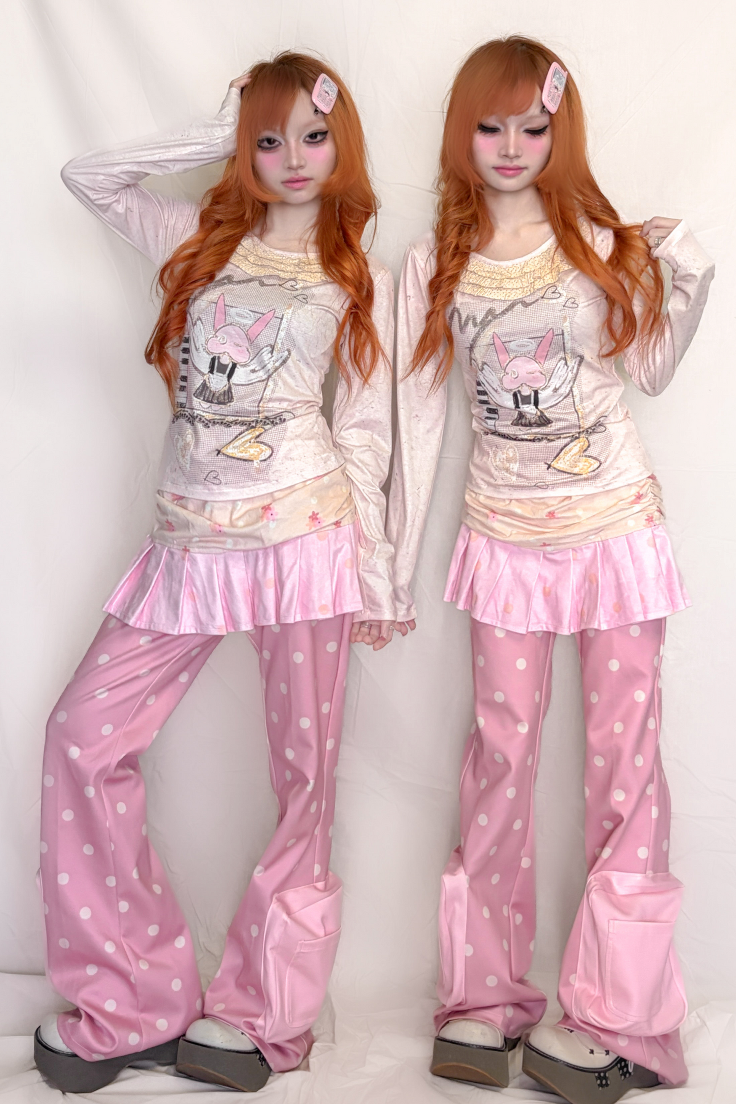 Rosa gepunktete Sweatpants