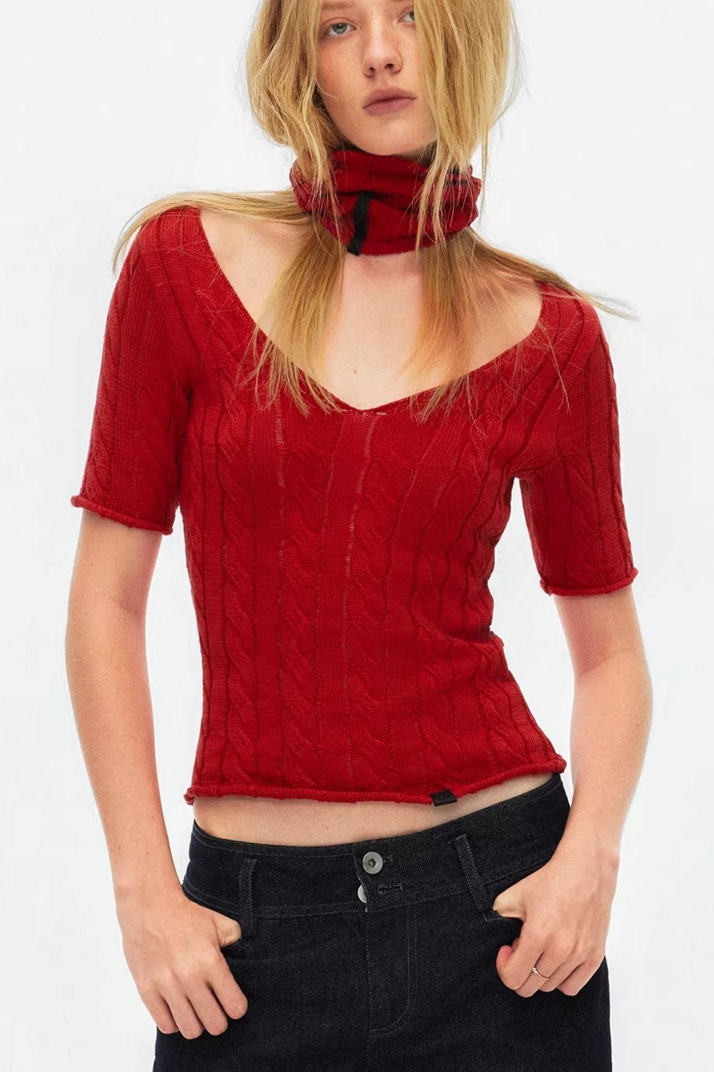 Vibrant red short sleeve cable knit top featuring a trendy choker neck