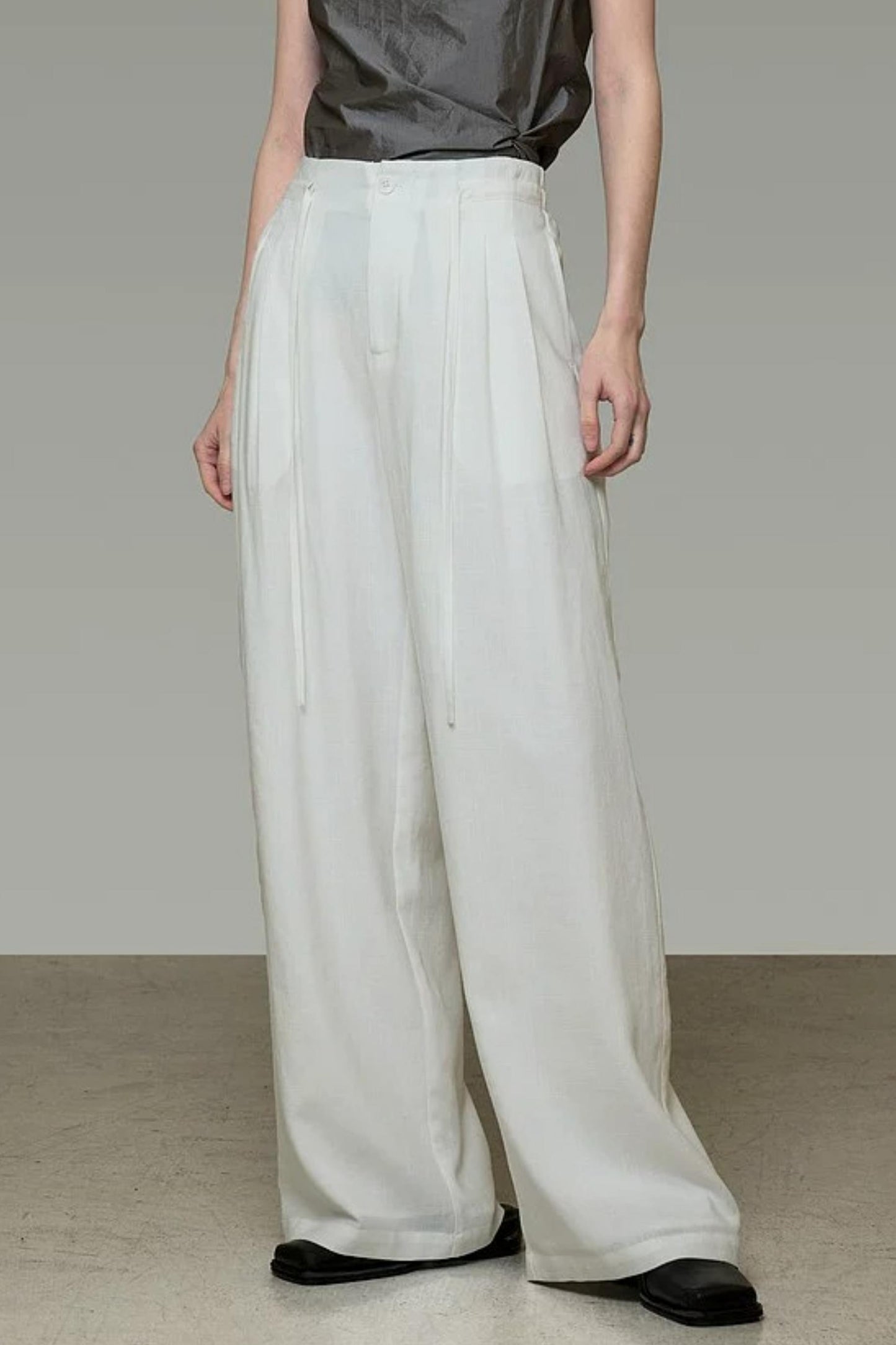 Pantalon élégant taille haute à jambes larges