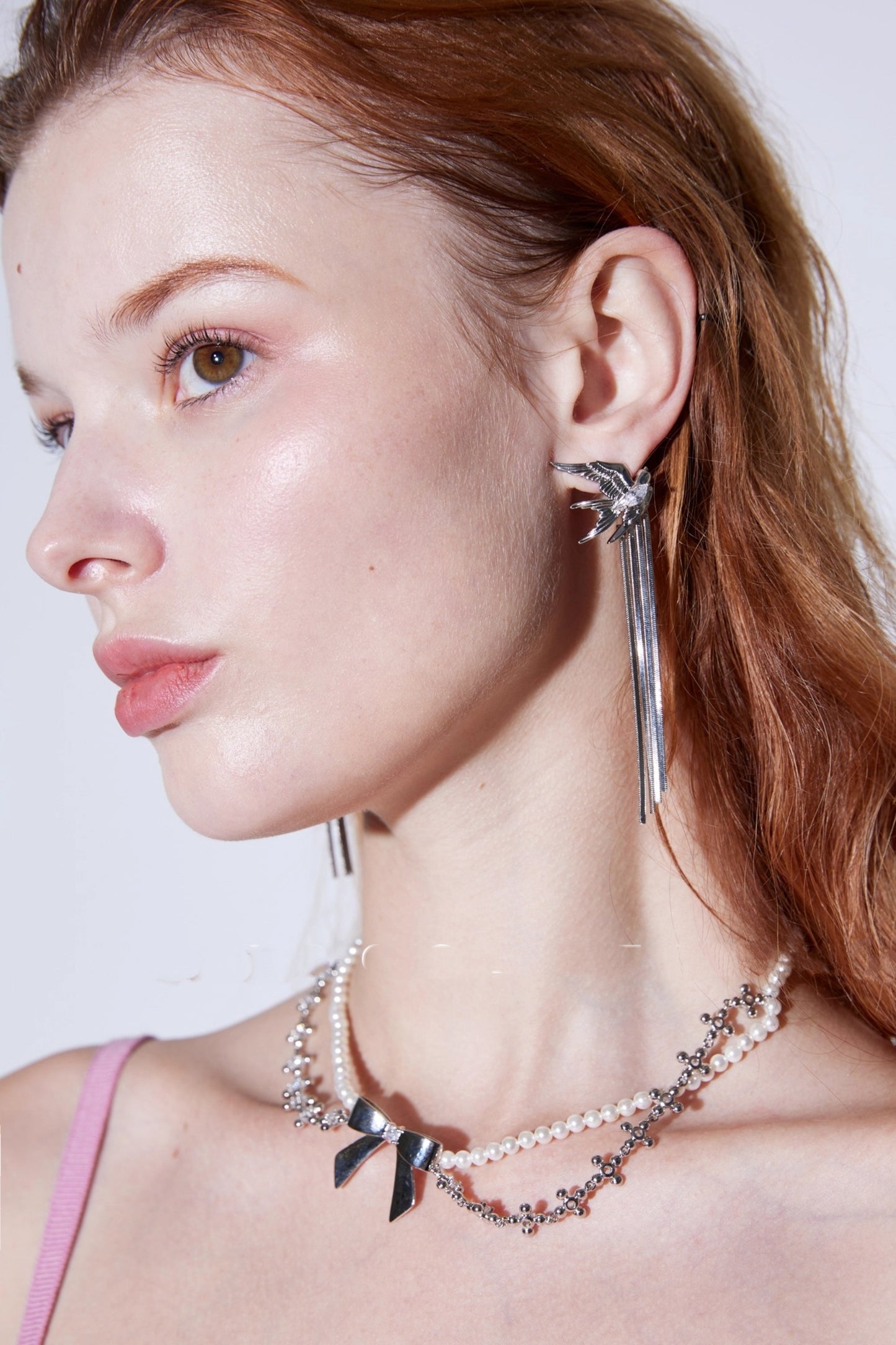 Annual Platinum Swallow Earrings