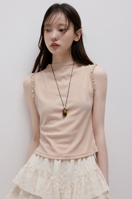 Gilet tricoté en dentelle rêveuse