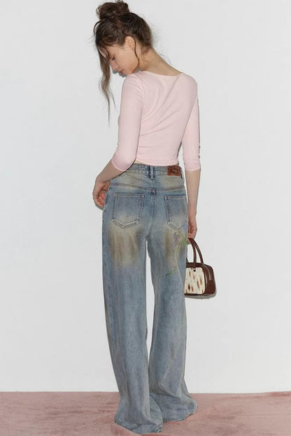 Blaue Vintage-Rosen-Jeanshose