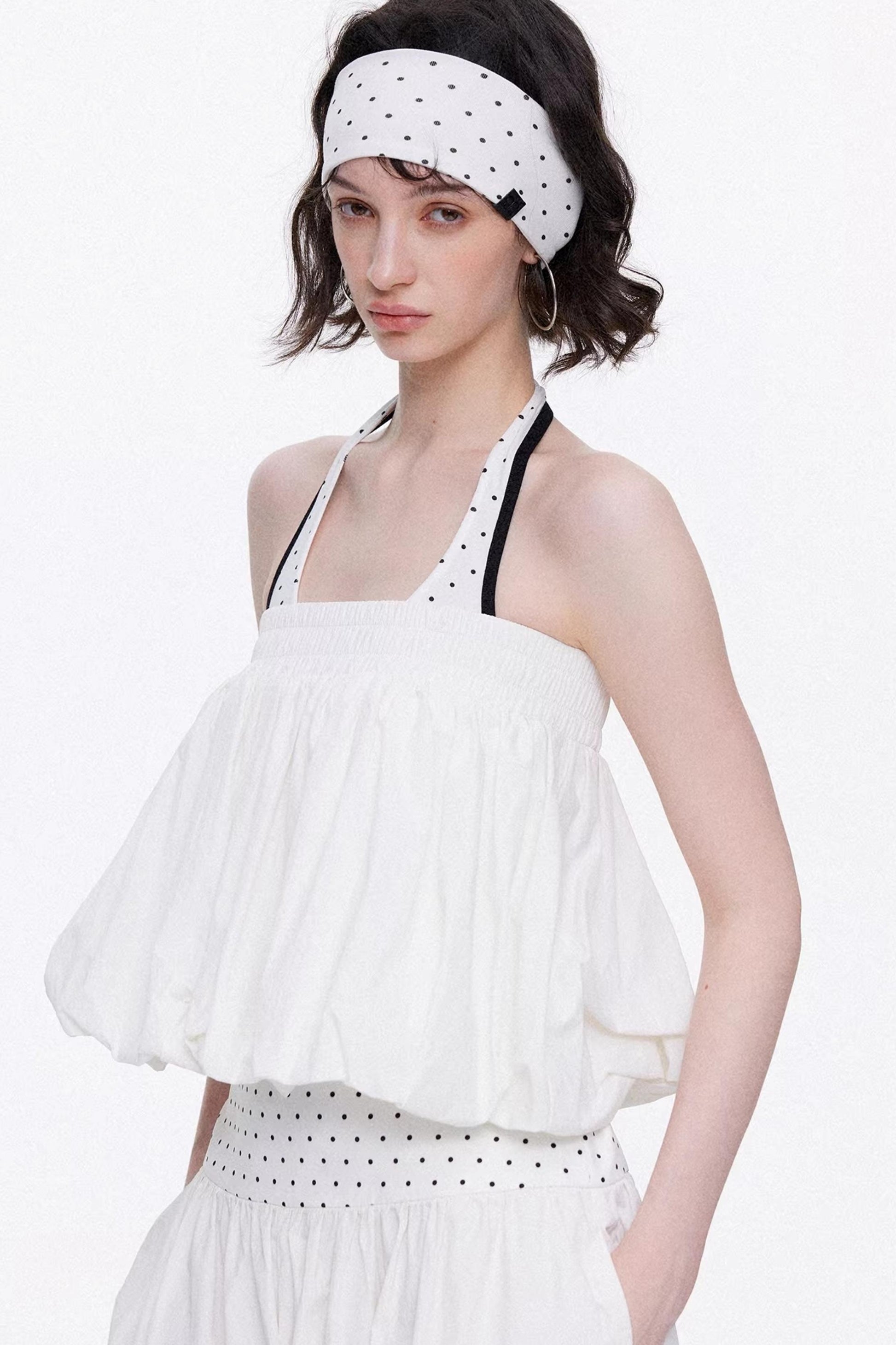 Elegant off-white minimalist knitted set featuring a tube top