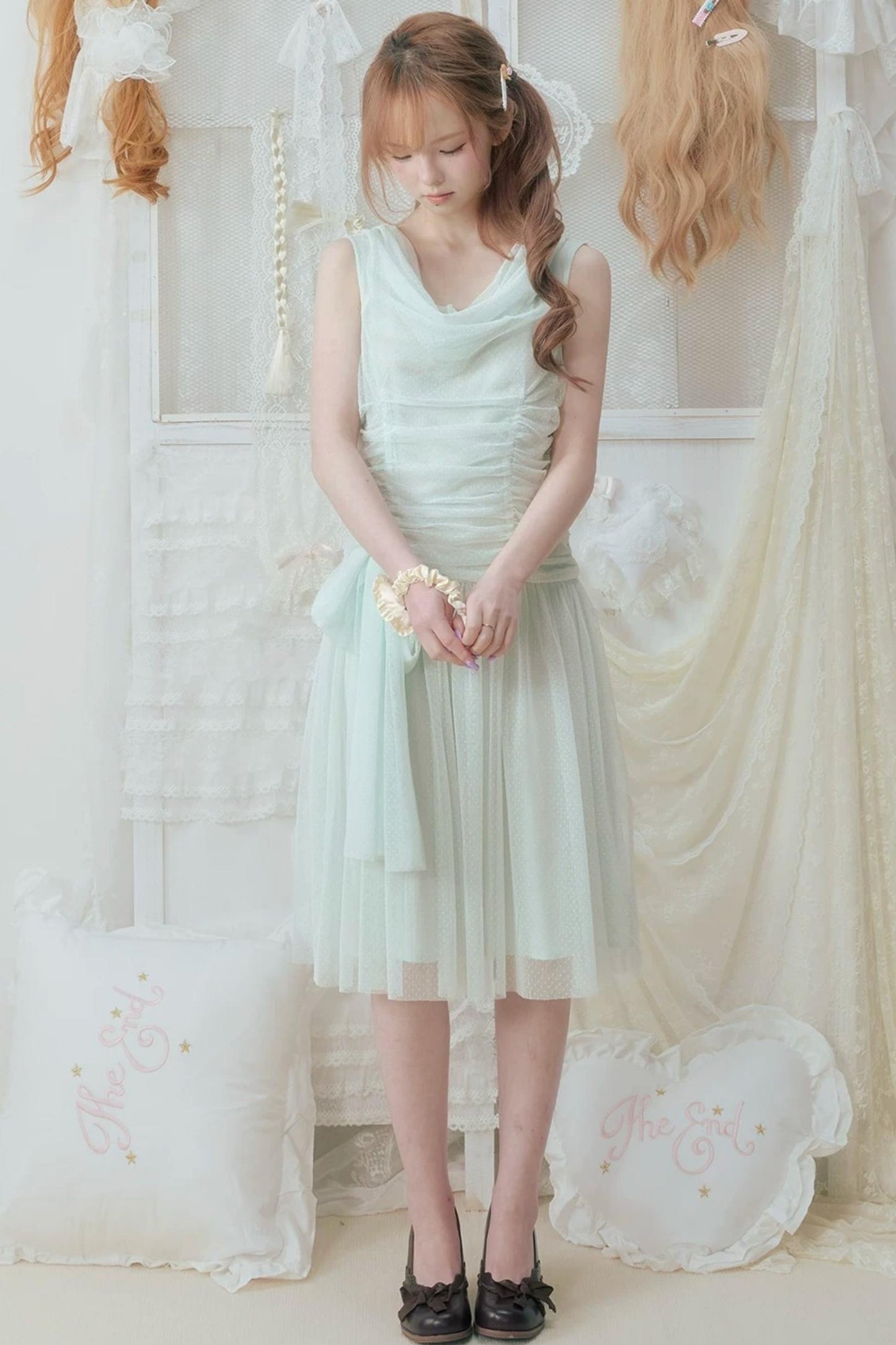 Abito verde menta plissettato in tulle
