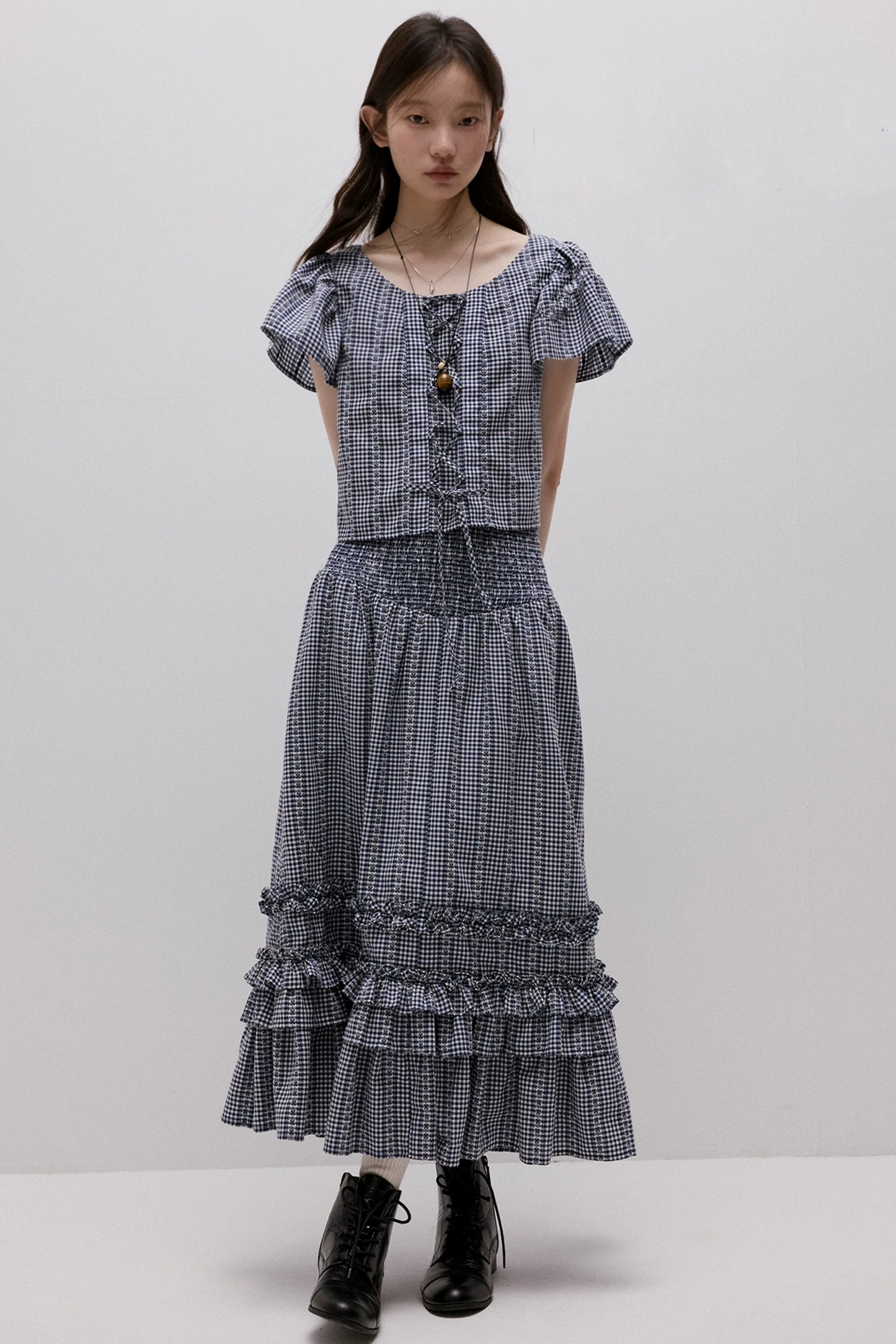 Maglia vichy blu con lacci