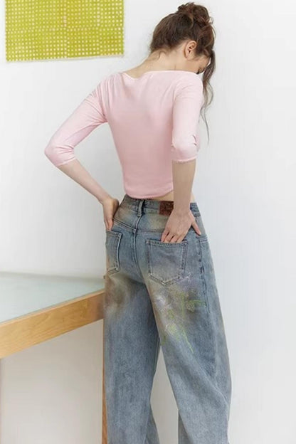 Blaue Vintage-Rosen-Jeanshose