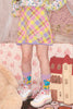 Gonna in maglia a quadri rosa e verde