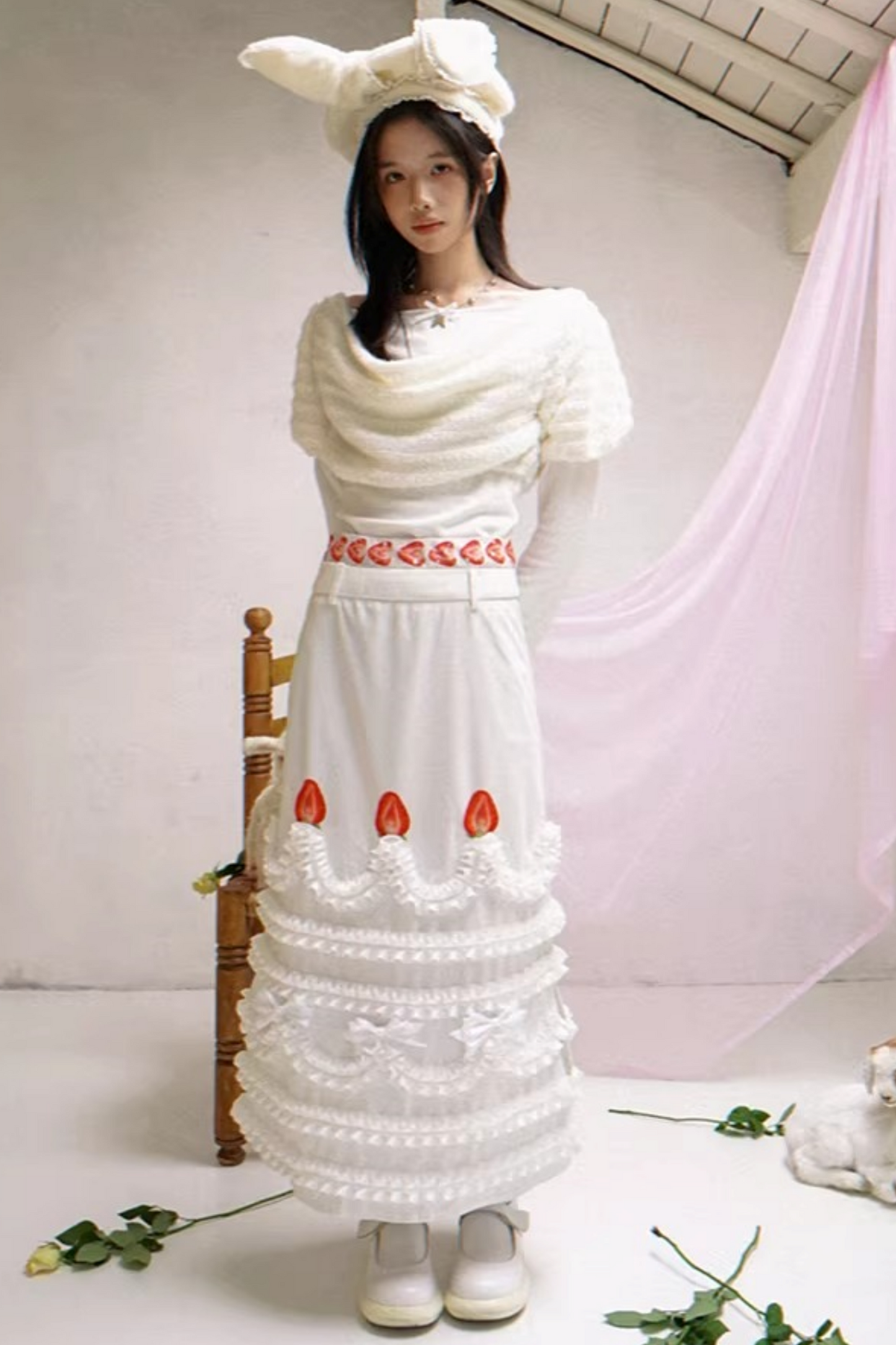 Gestricktes Oberteil mit drapiertem Kragen