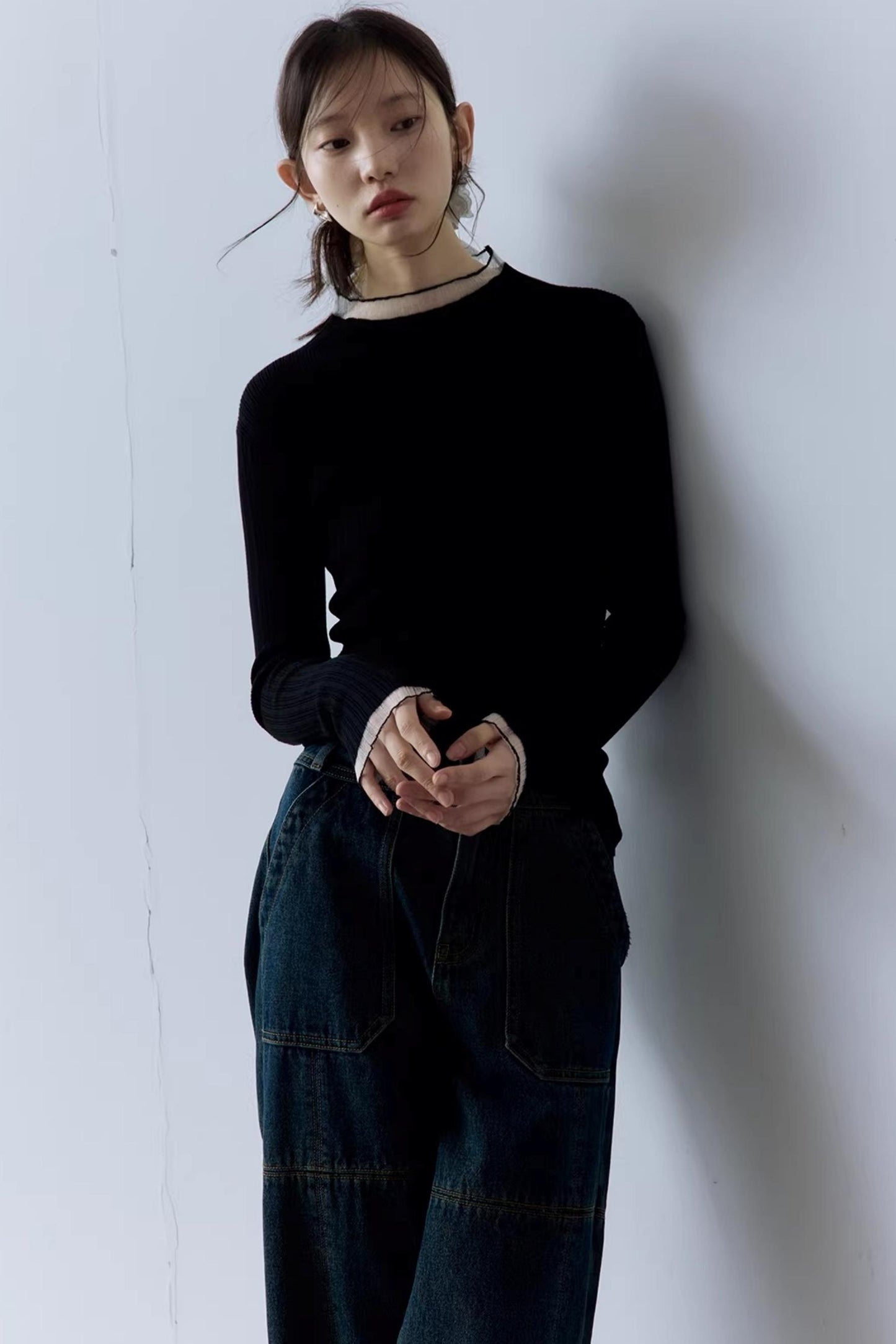Schwarzes geripptes Stricktop