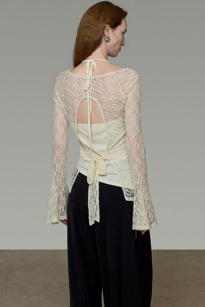 Blusa elegante in pizzo con spalline