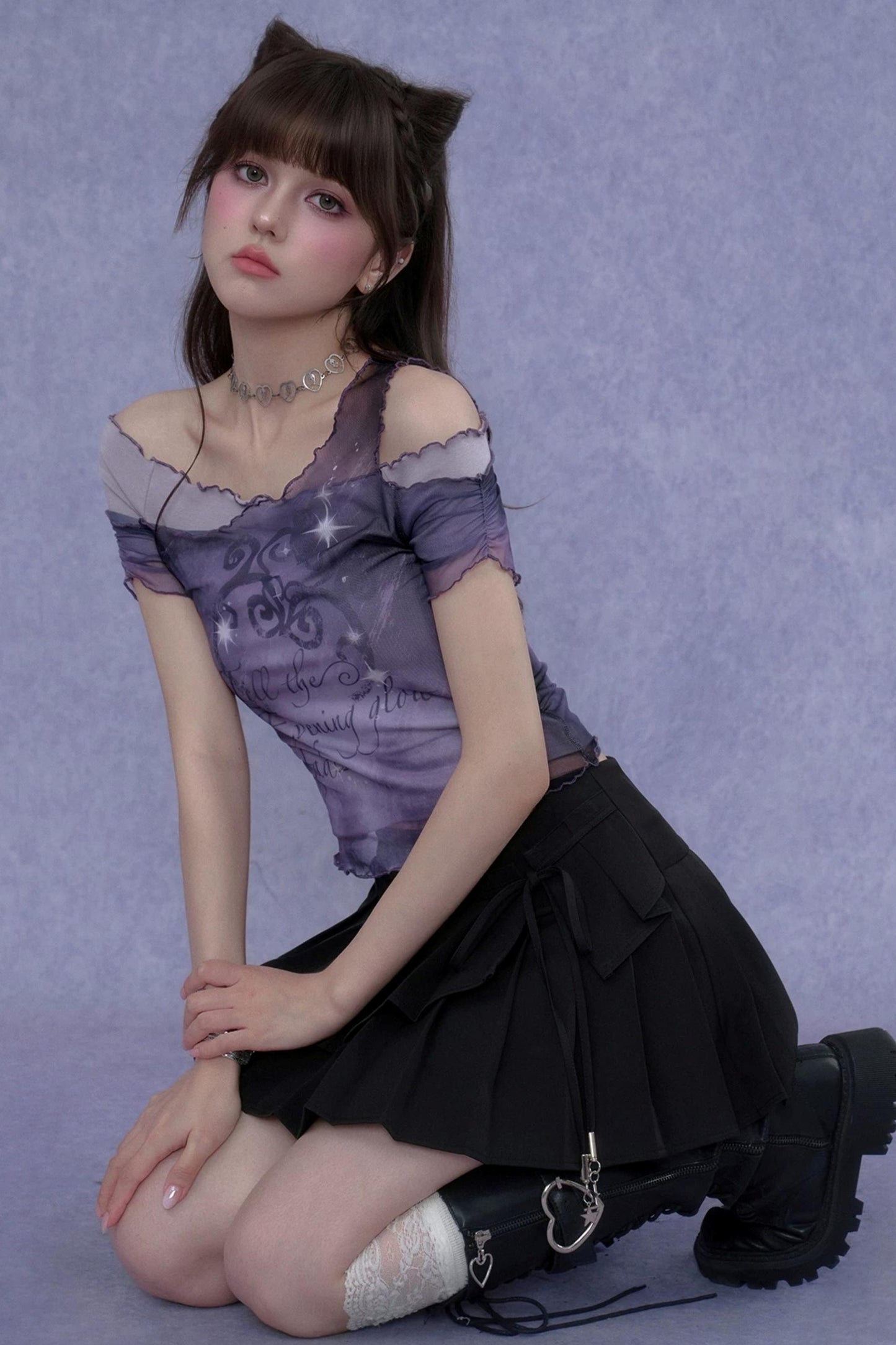 Chemisier violet en résille superposée