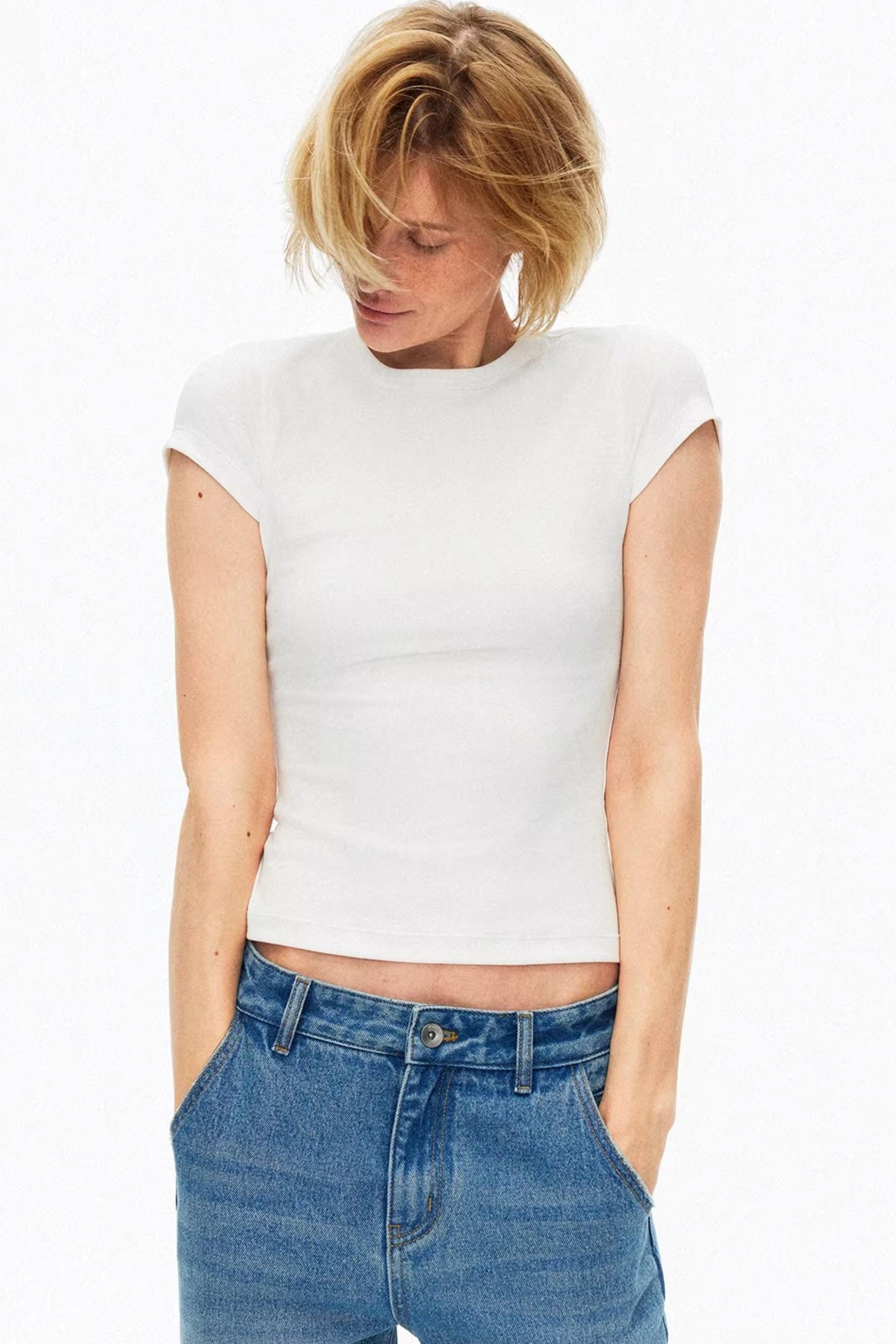Classic white slim-fit cotton summer top for minimalist look