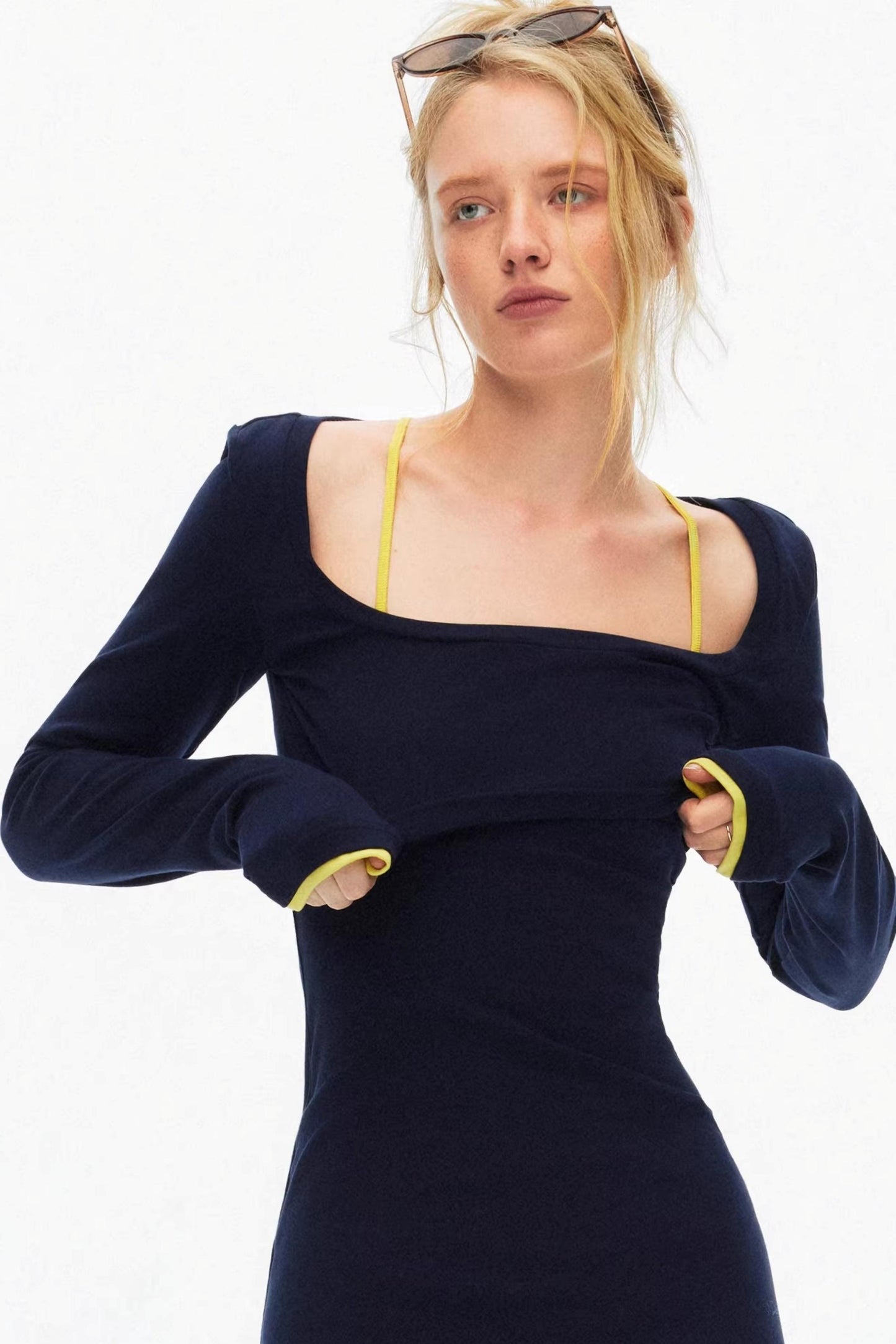 Elegant navy blue long-sleeve knitted top with square neckline