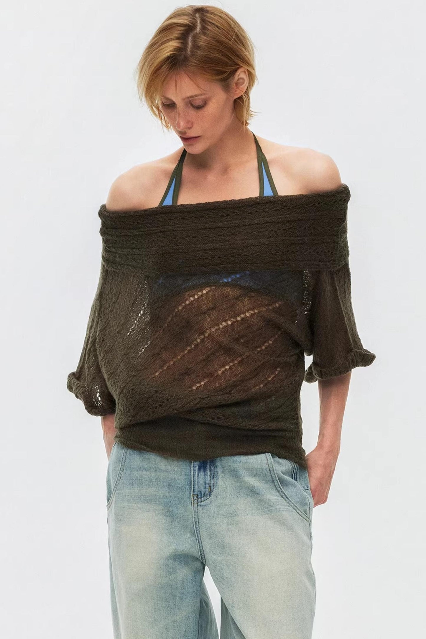 Sophisticated olive green one-shoulder knit blouse for modern chic style