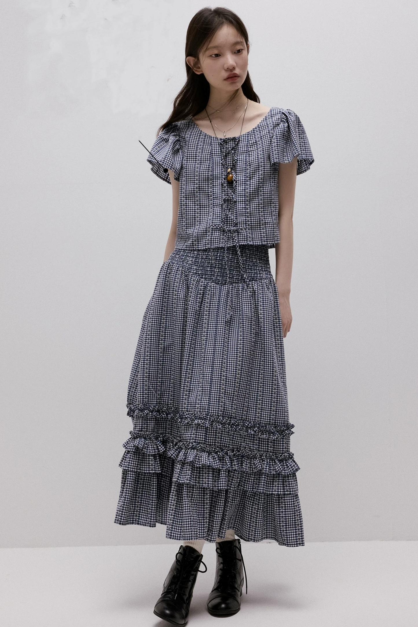 Maglia vichy blu con lacci