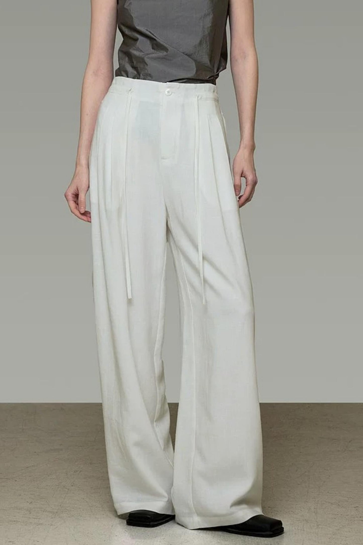 Pantalon élégant taille haute à jambes larges