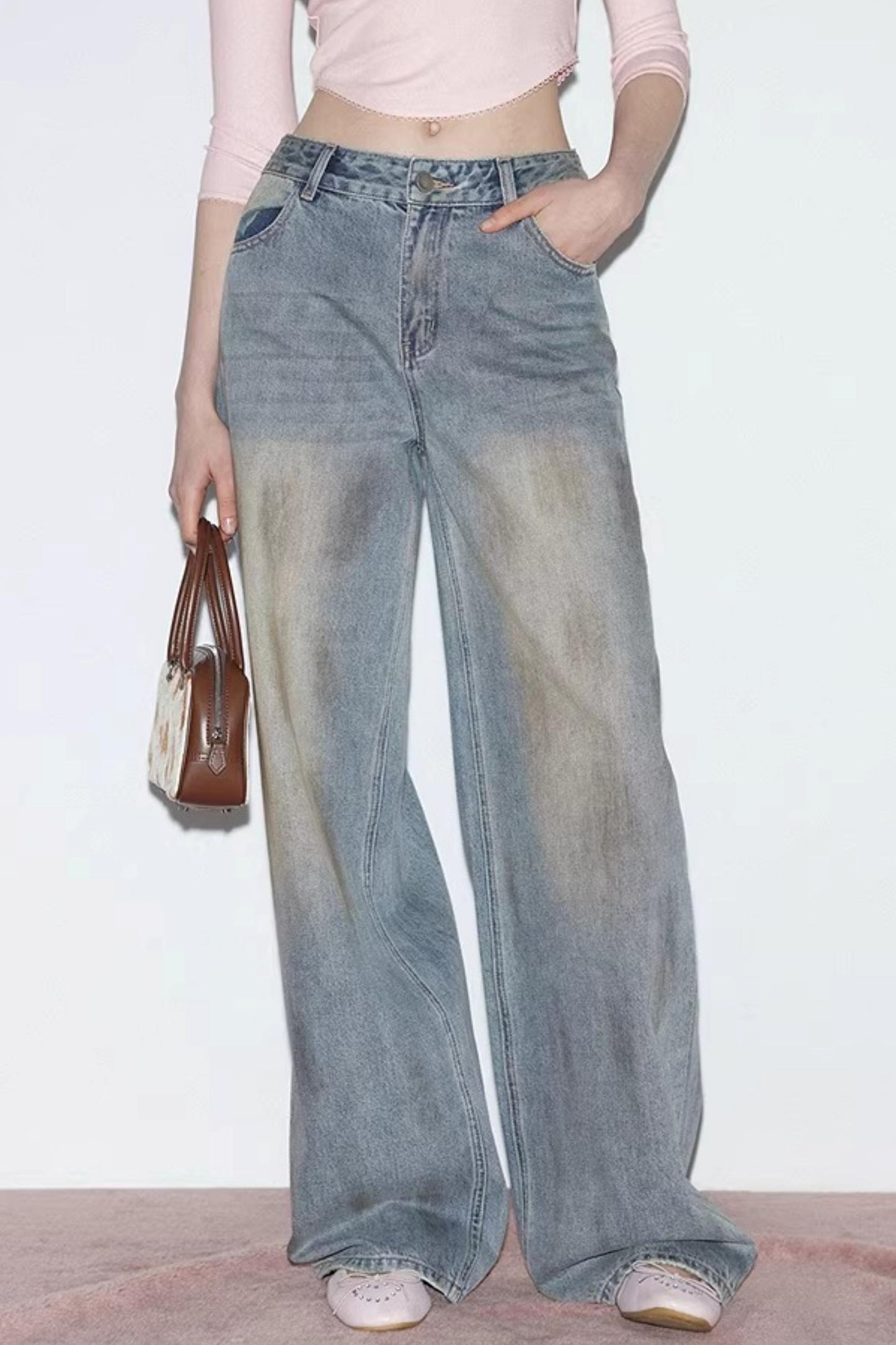 Blaue Vintage-Rosen-Jeanshose
