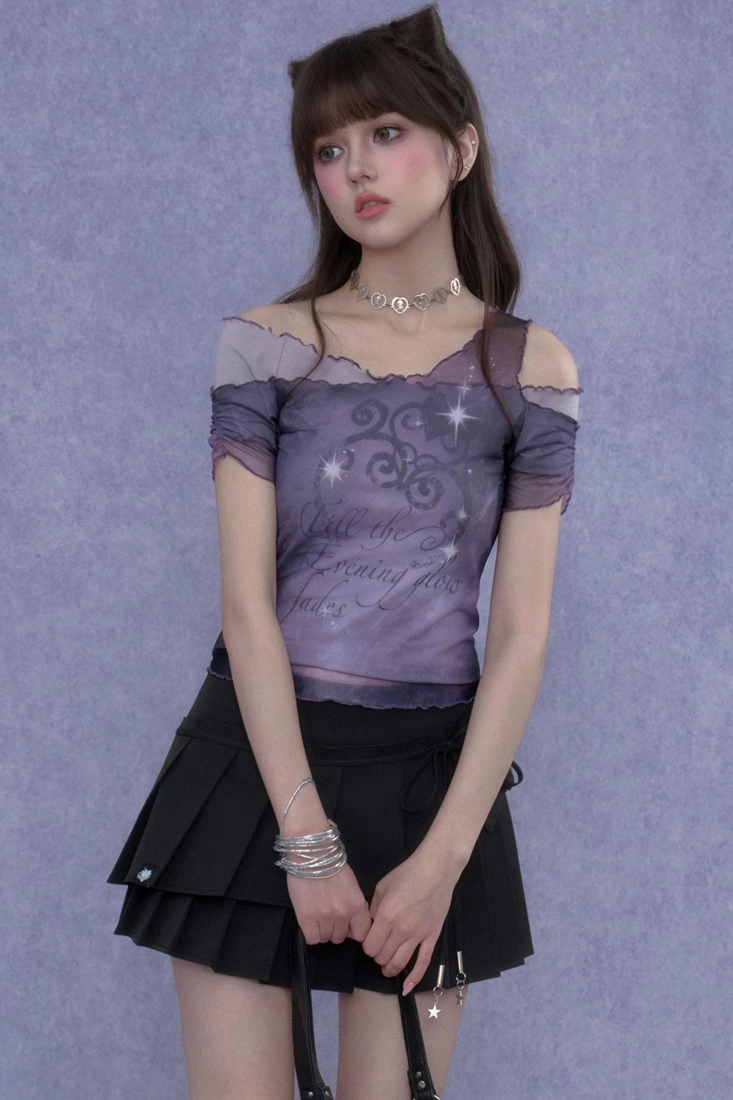 Chemisier violet en résille superposée
