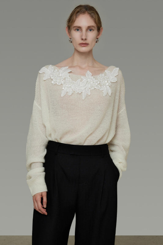 Haut tricoté orné de fleurs
