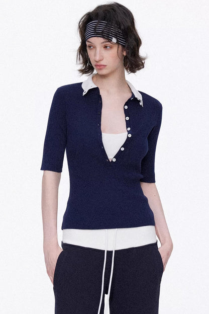 Elegant navy blue and white color-blocked lyocell knit top