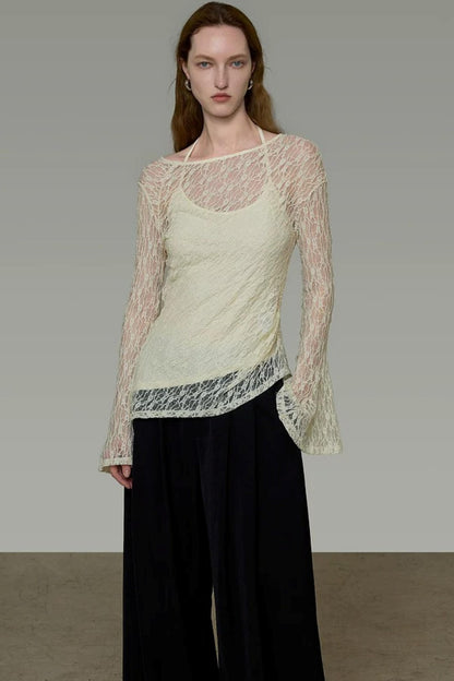 Blusa elegante in pizzo con spalline