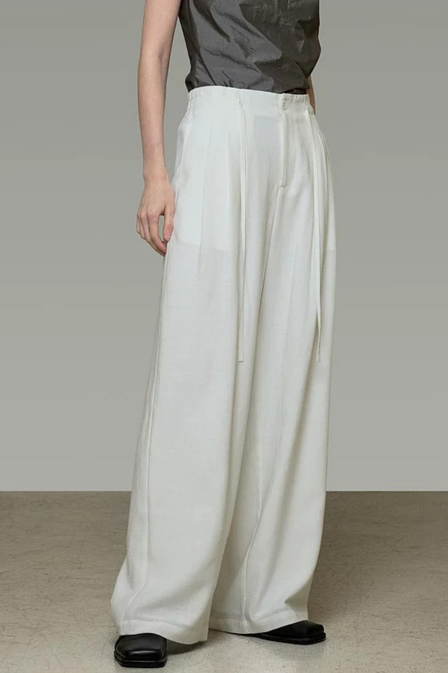 Pantalon élégant taille haute à jambes larges