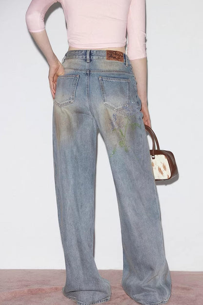 Blaue Vintage-Rosen-Jeanshose