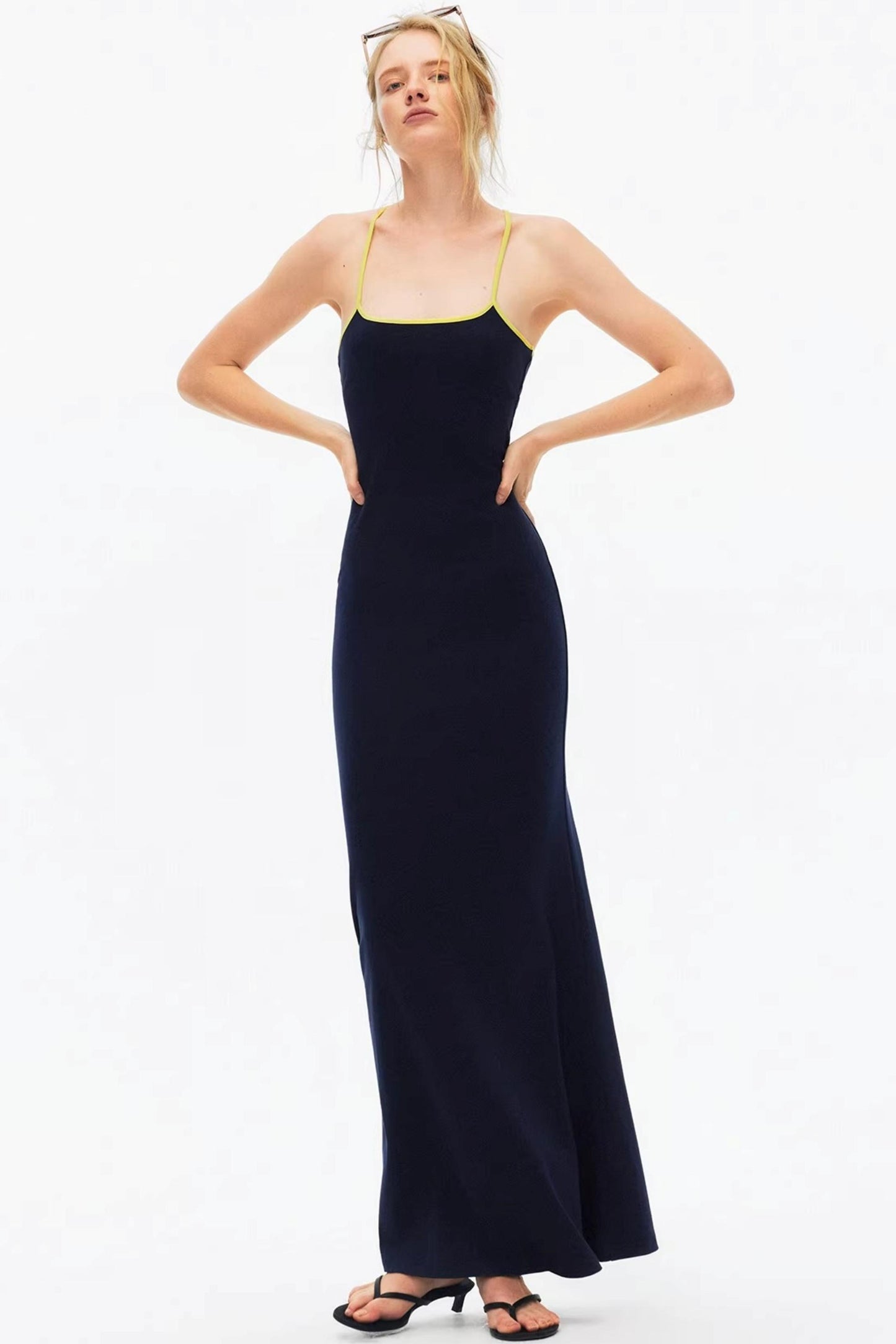 Chic navy blue racerback maxi dress with lime green strap details