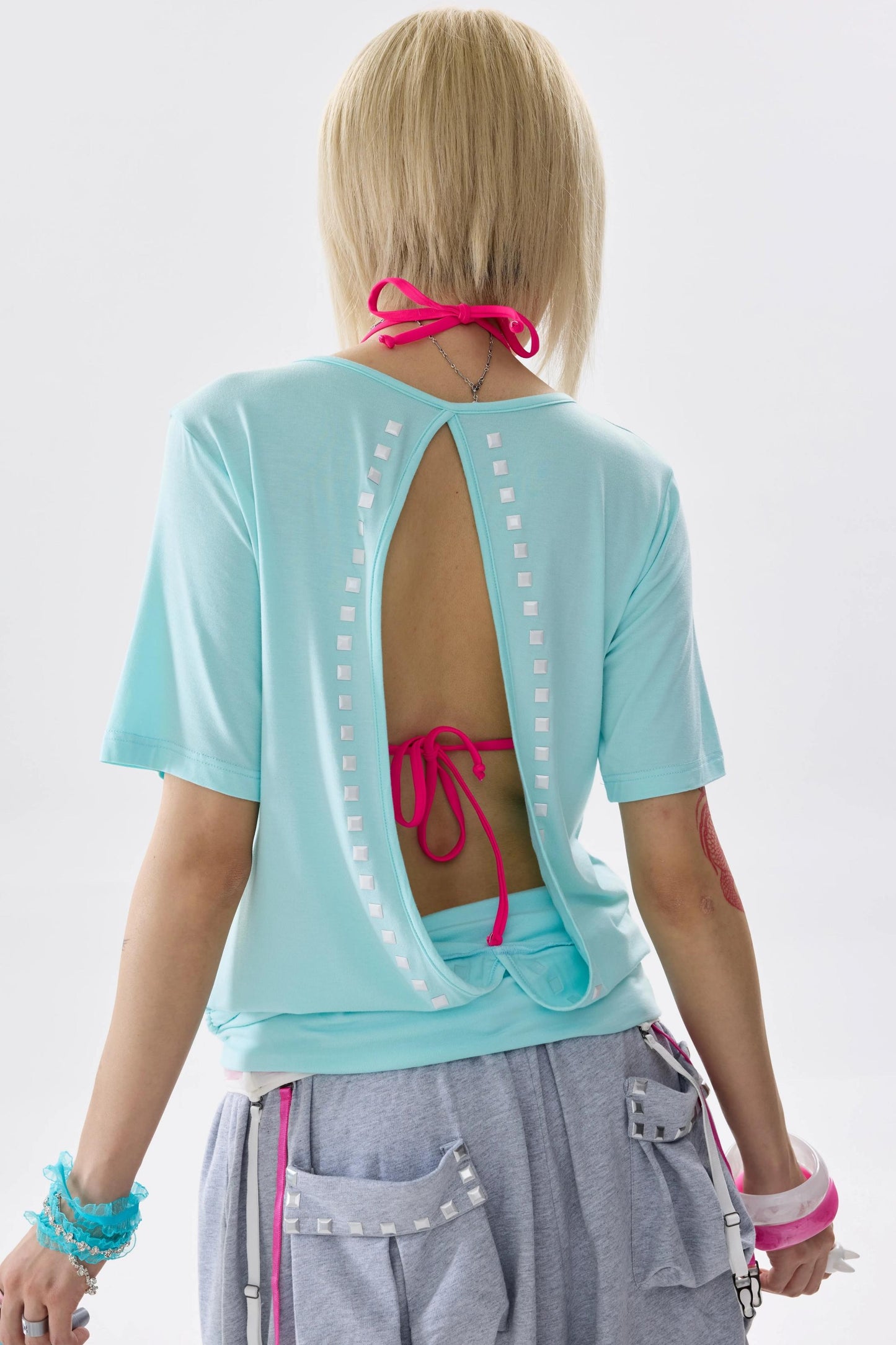 Abito in maglia elasticizzata con schiena scoperta