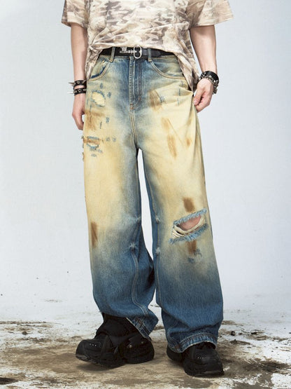 Yellow mud dyed ripped blue straight jeans