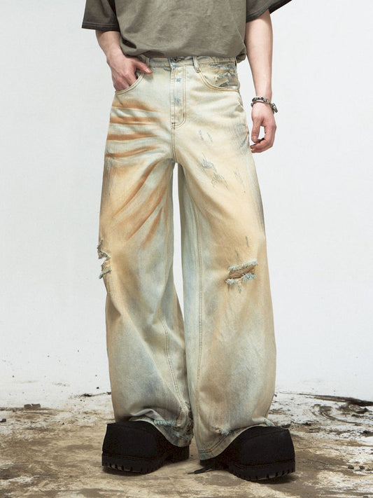 Yellow mud dyed washed and old worn holes straight jeans