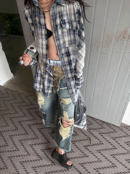 Low-rise ripped camouflage patchwork denim