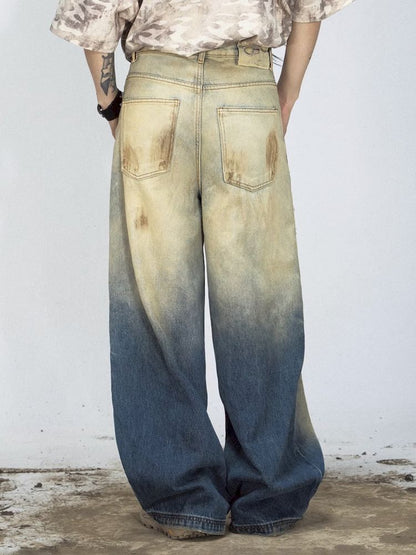 Yellow mud dyed ripped blue straight jeans