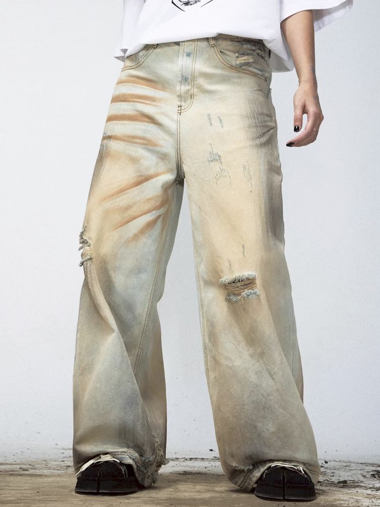 Yellow mud dyed washed and old worn holes straight jeans