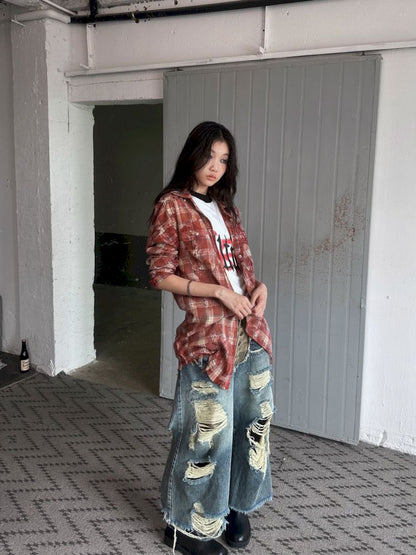 Low-rise ripped camouflage patchwork denim