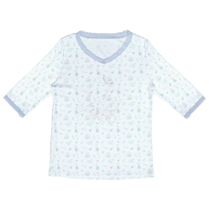 Kindlich wirkende florale Glitzerbluse