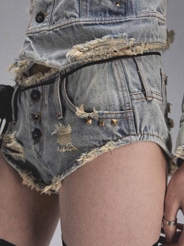 Distressed denim shorts