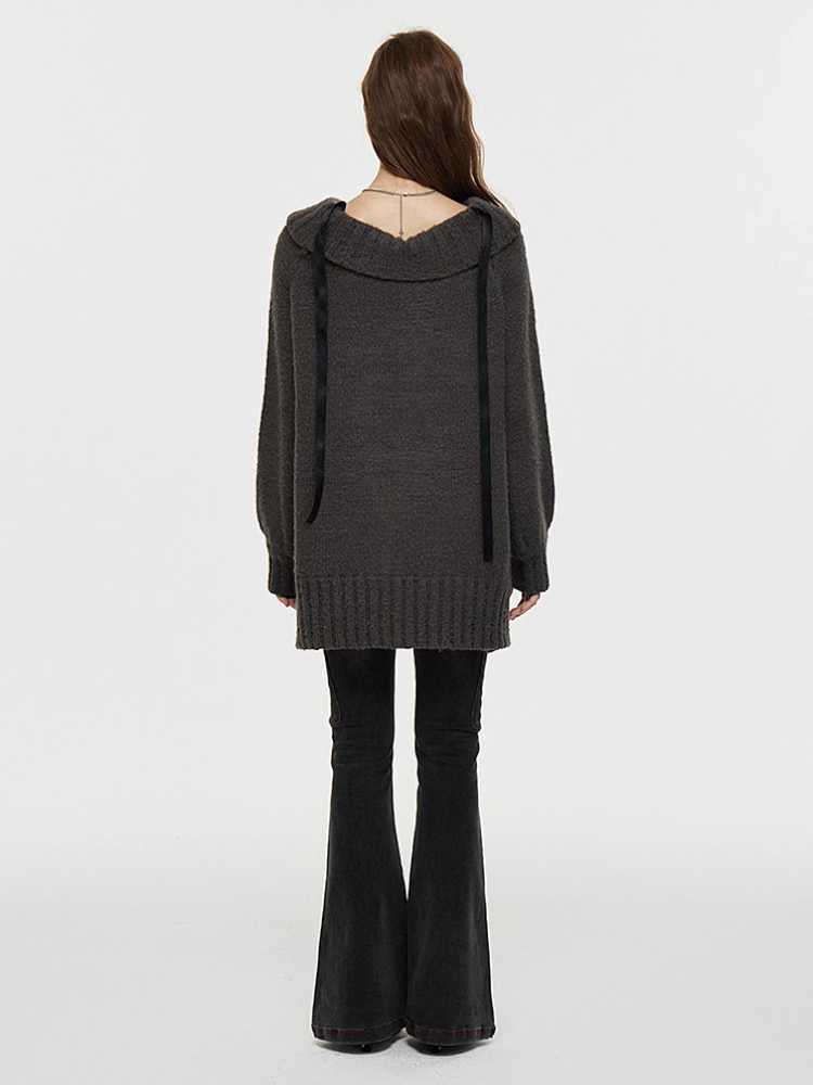 One-shoulder wool sweater and leg warmers