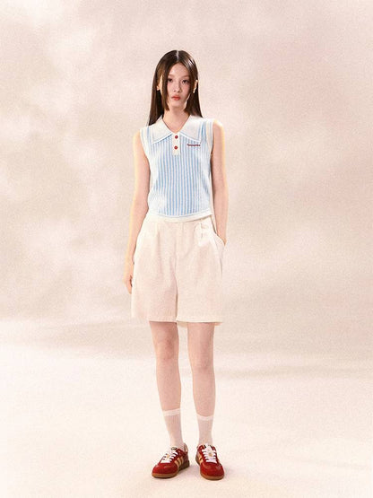 Polo knit short sleeves and pleated skirt