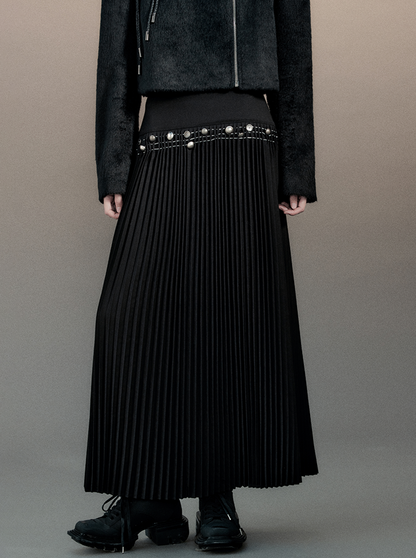 high-waisted pleated skirt