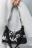 Schwarzes Graffiti-Modell Leder