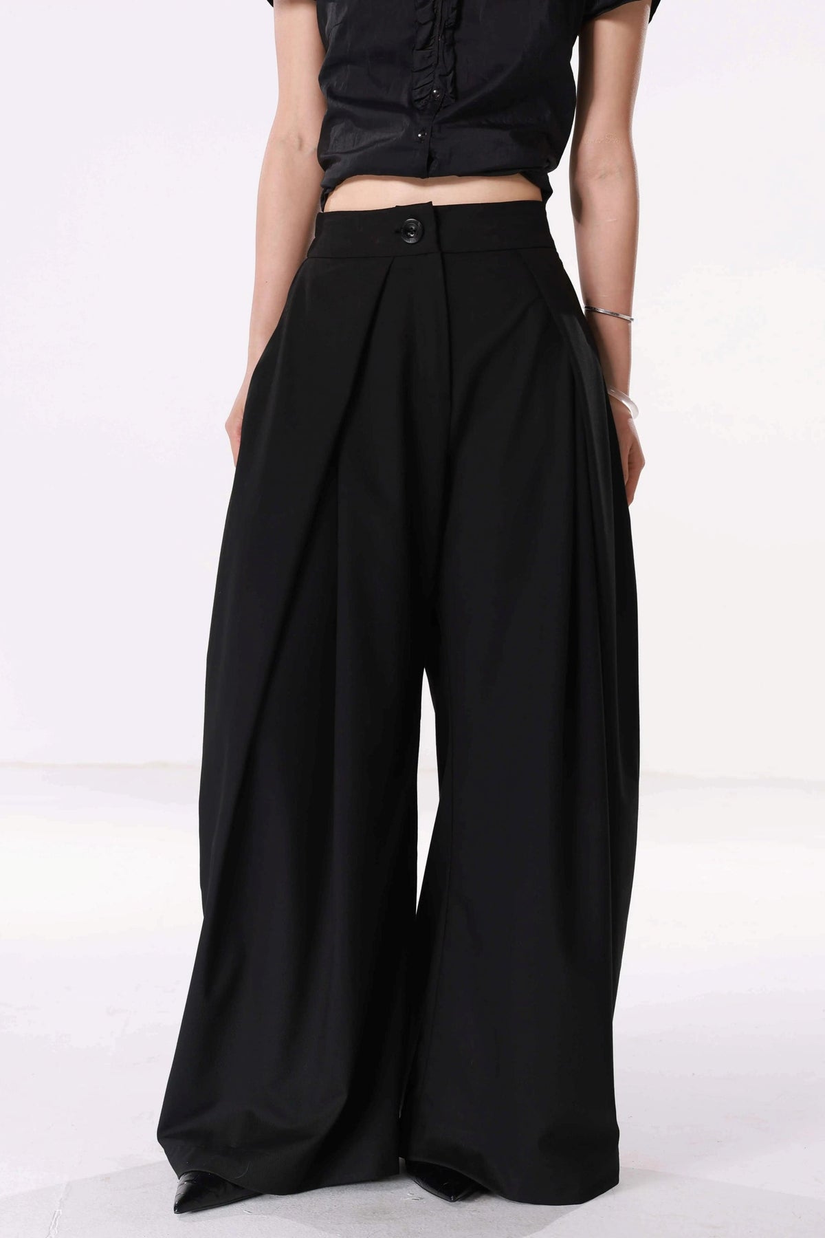 Pantalon drapé à jambes larges