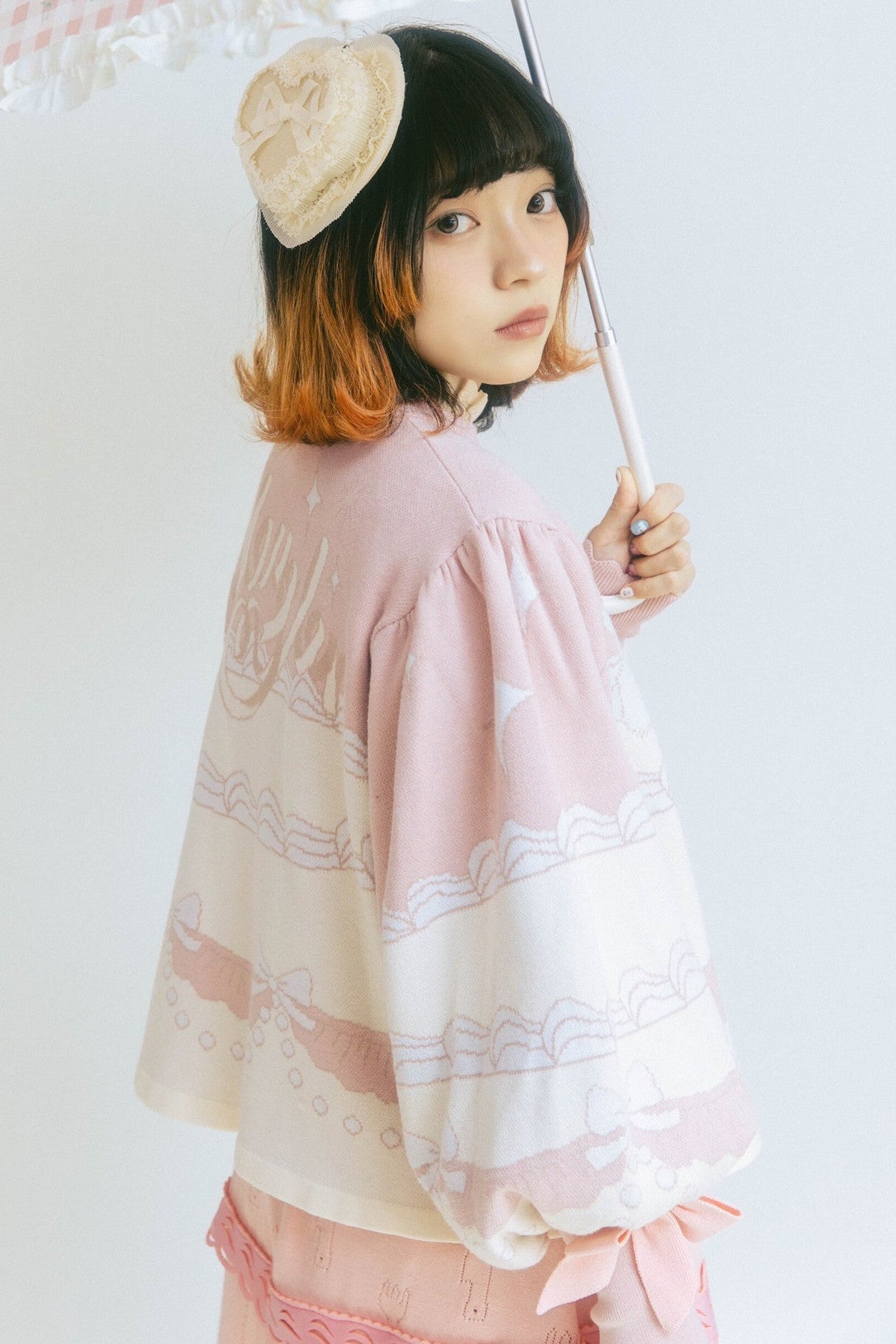 Cardigan a maglia con fiocco e coniglio