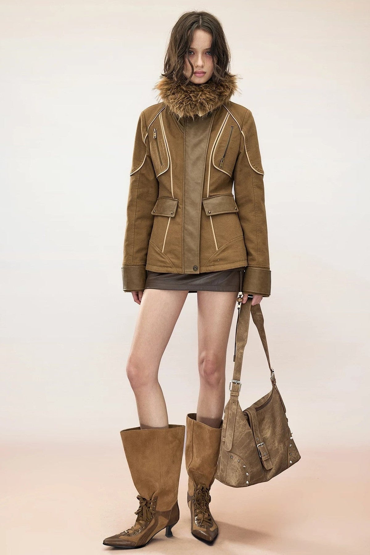 Gesteppte Baumwolljacke im Patchwork-Stil mit Lederapplikation