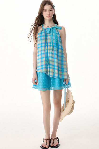 Blaues kariertes Neckholder-Kleid mit Schleife
