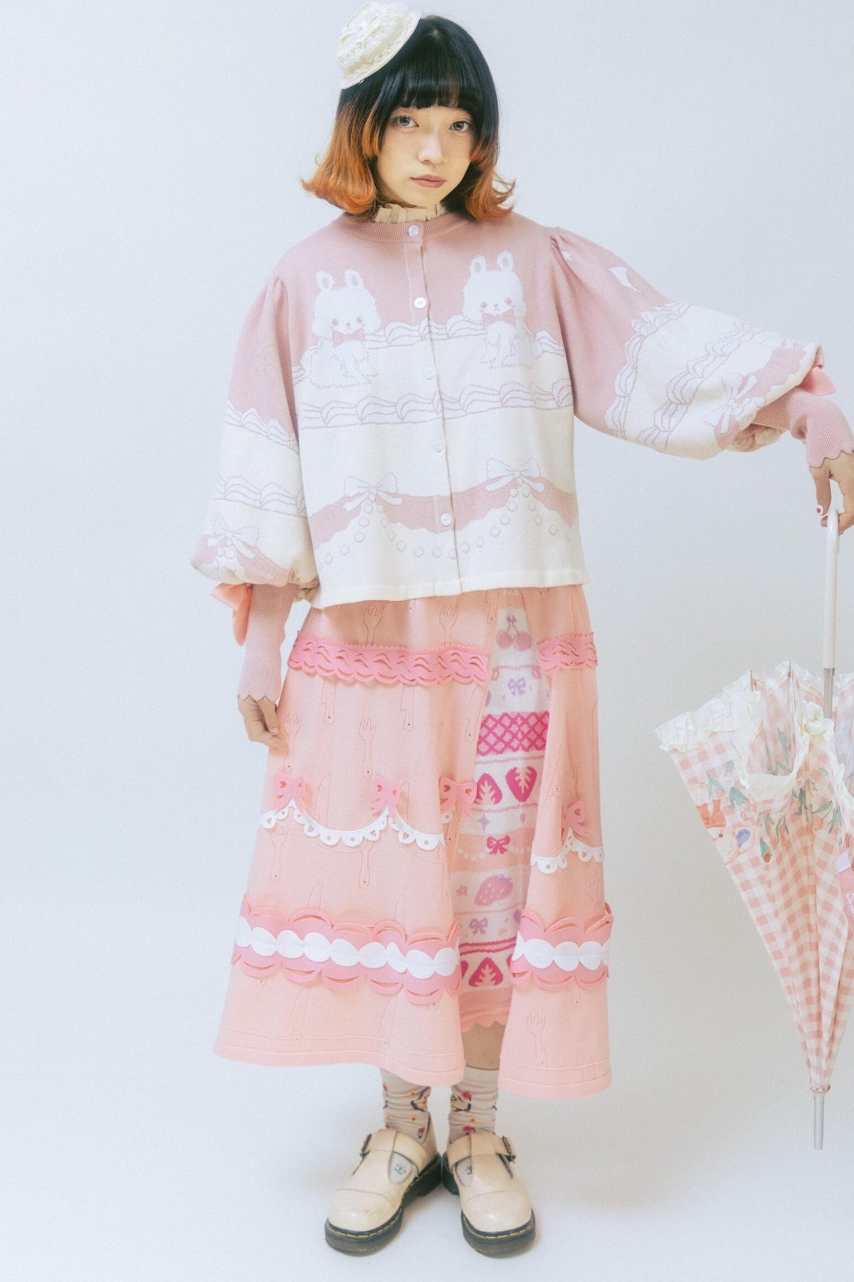 Cardigan a maglia con fiocco e coniglio